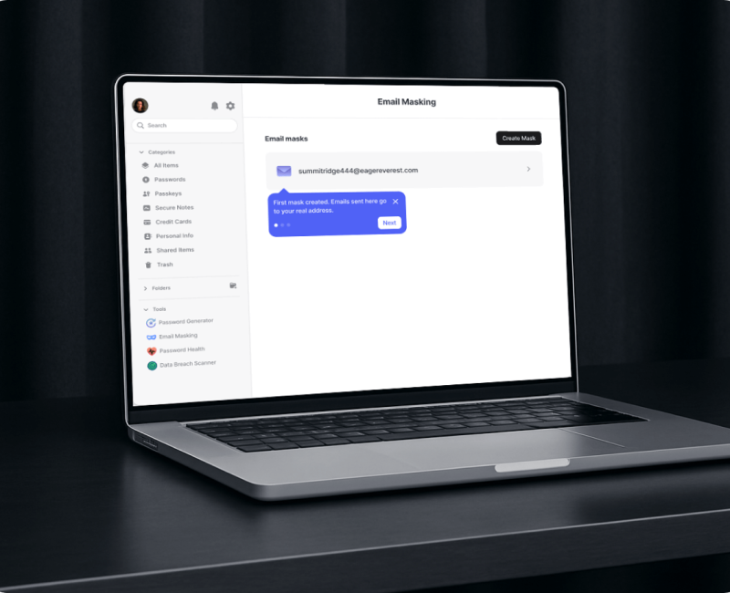 Laptop showing the Email Masking dashboard with walkthrough tooltip